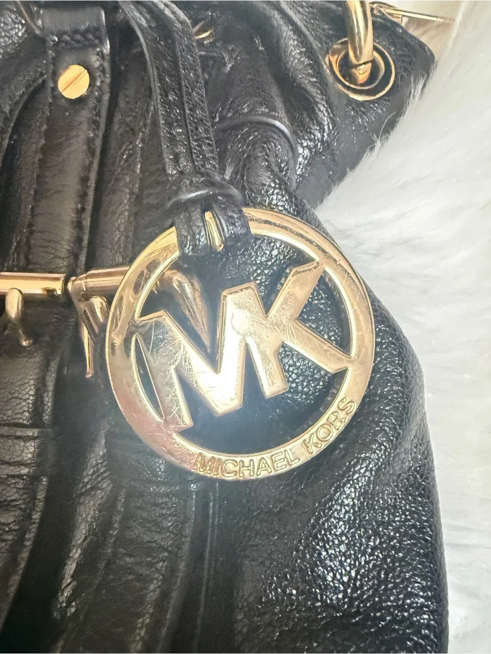 Michael Kors Black Leather Satchel with Gold Accents
